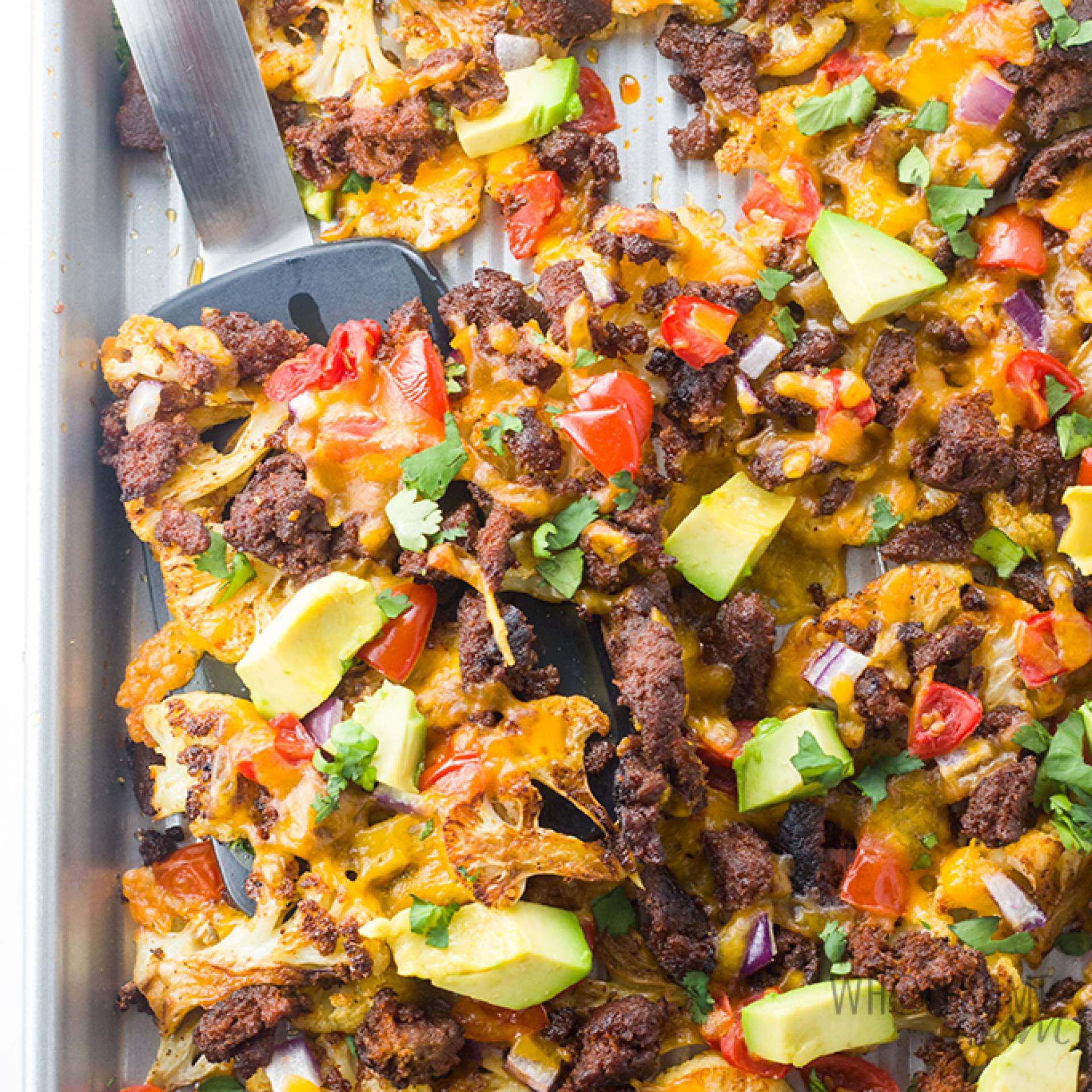 Loaded Cauliflower Nachos with Ground Turkey and Queso - Paleo