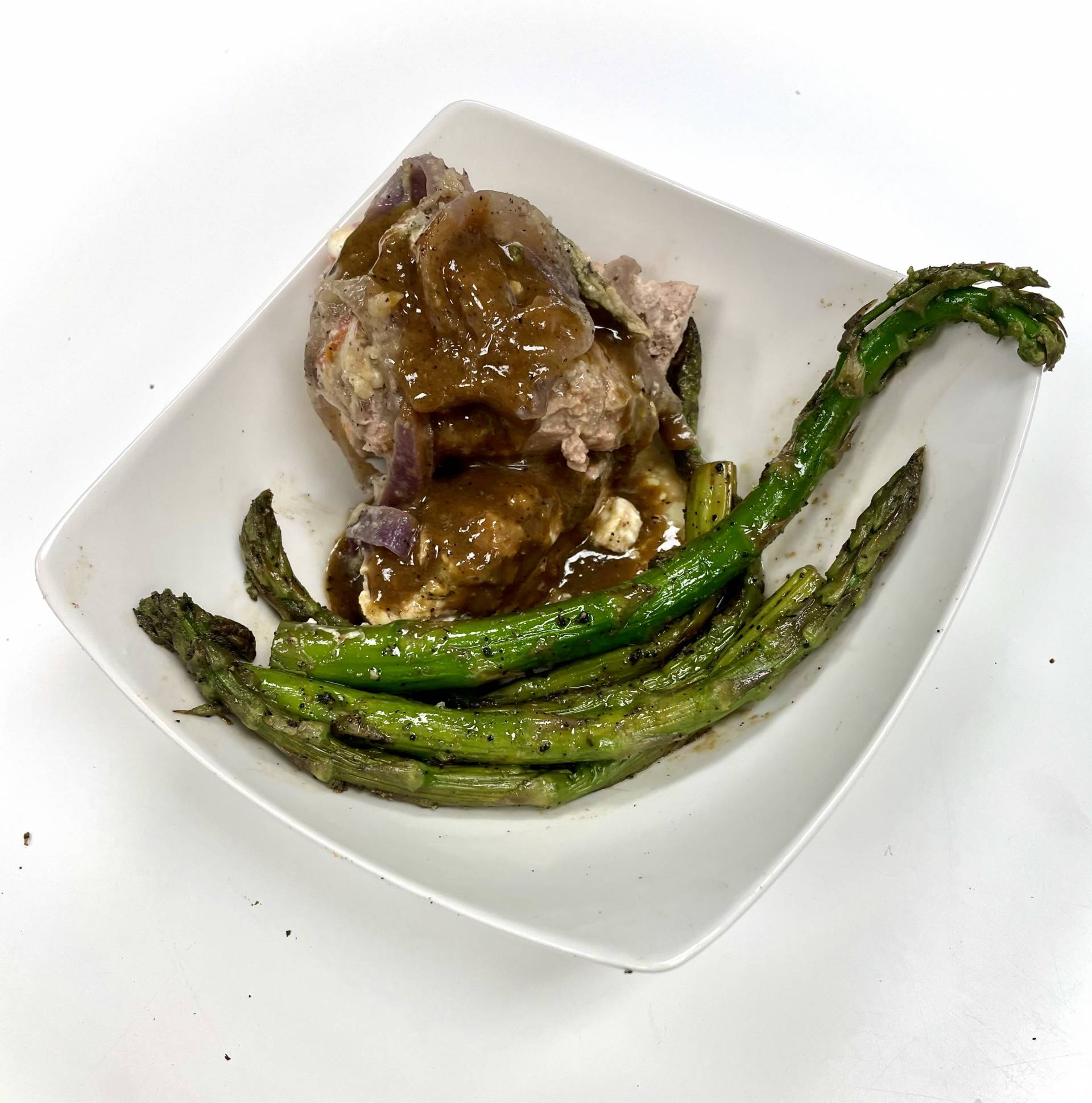 Stuffed Pork Loin with Caramelized Onions and Asparagus - Low Fat
